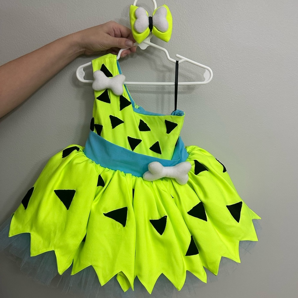 Custom Etsy Halloween costume. Pebbles costume with bow clip on hair accessory.